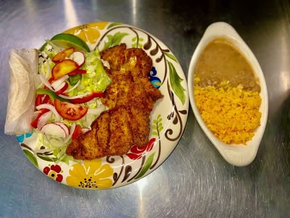 Milanesa De Pollo.